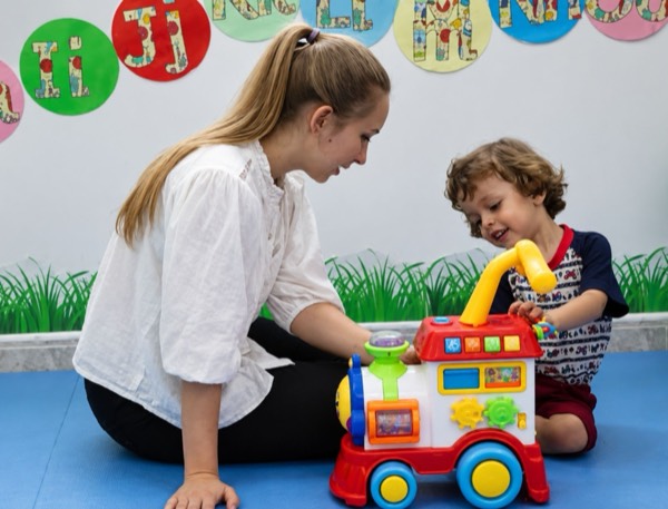 A teacher working one to one with a child
