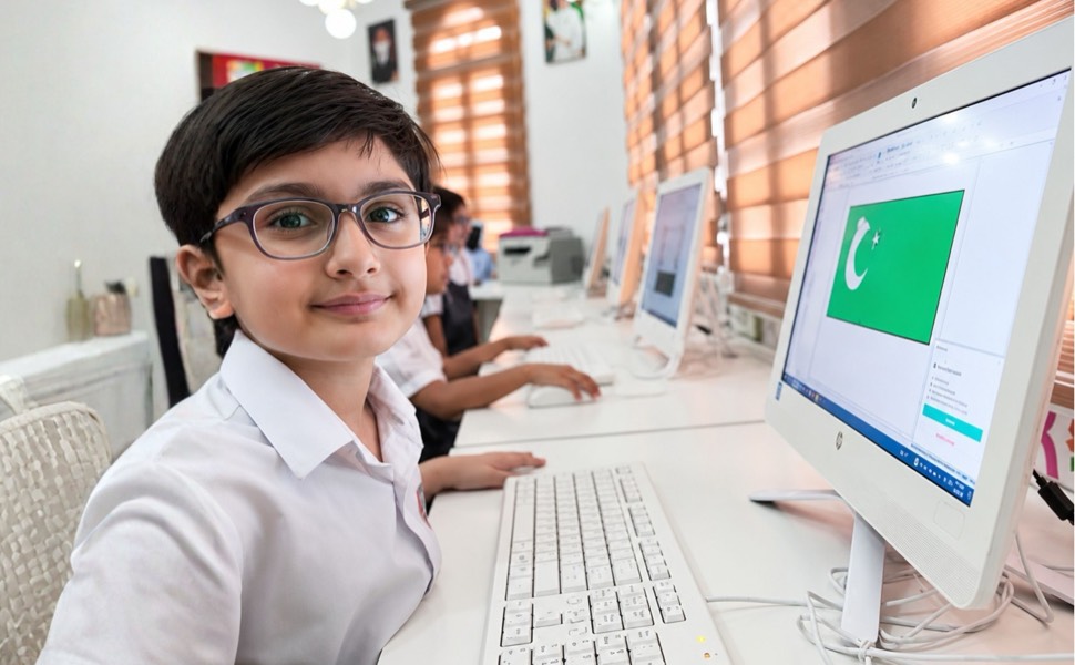 Students working in the ICT room at Happyhome